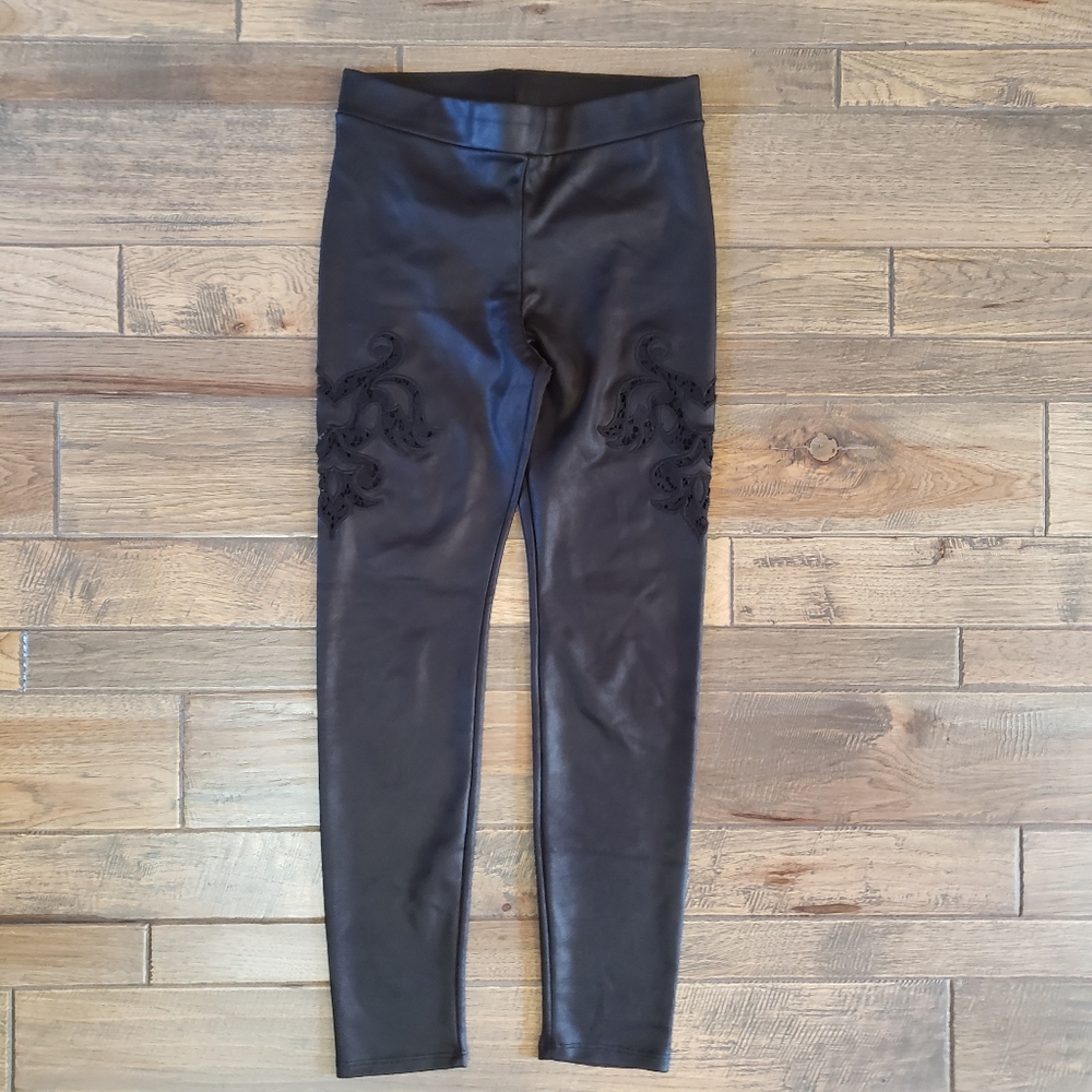 Bebe Black appliqué leggings sheer side cut out